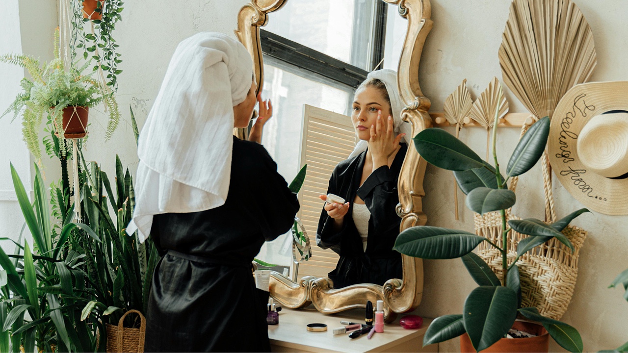 Woman mirror houseplants