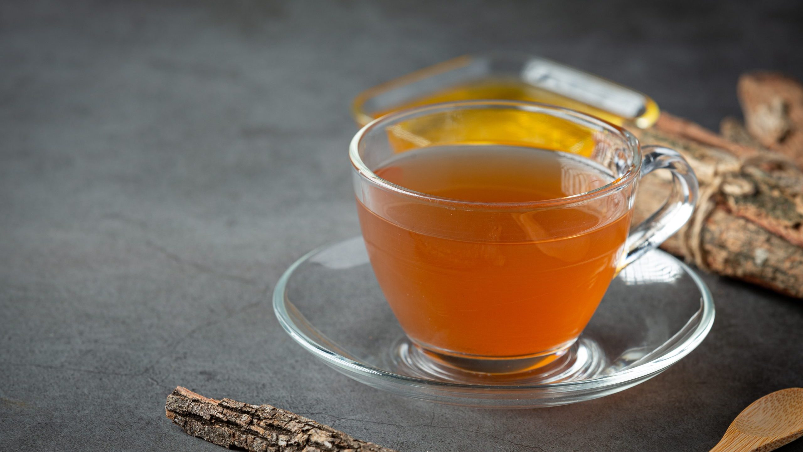 hot tea and bark on table