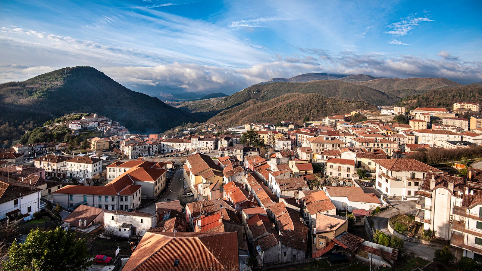 A picturesque aerial view of Ollolai village in the mountains of Sardinia, Italy.