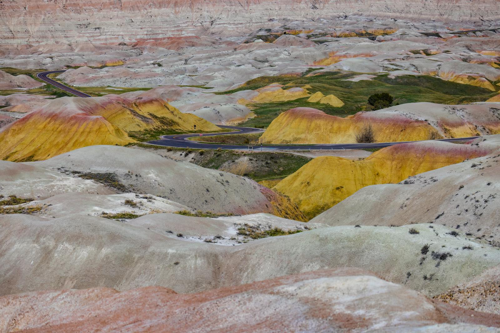 Vibrant, rolling landscape of Badlands National Park with earthy tones.