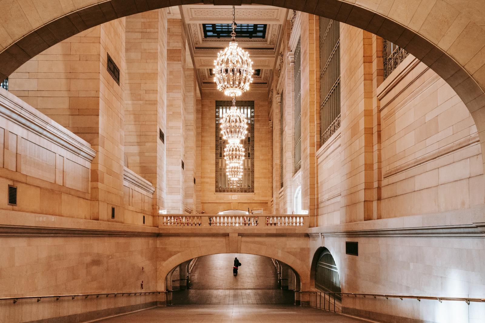 A classic interior view of Grand Central Terminal, showcasing its chandeliers and grand architecture.