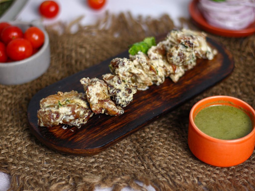 Chicken Tikka Masala Servings with Green Herb Sauce