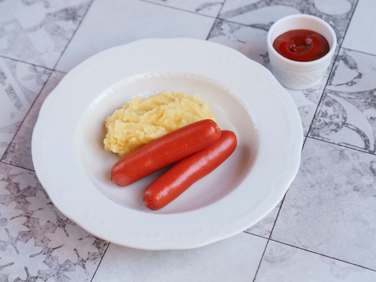 Plain Sausage and Mash Servings With Tomato Ketchup