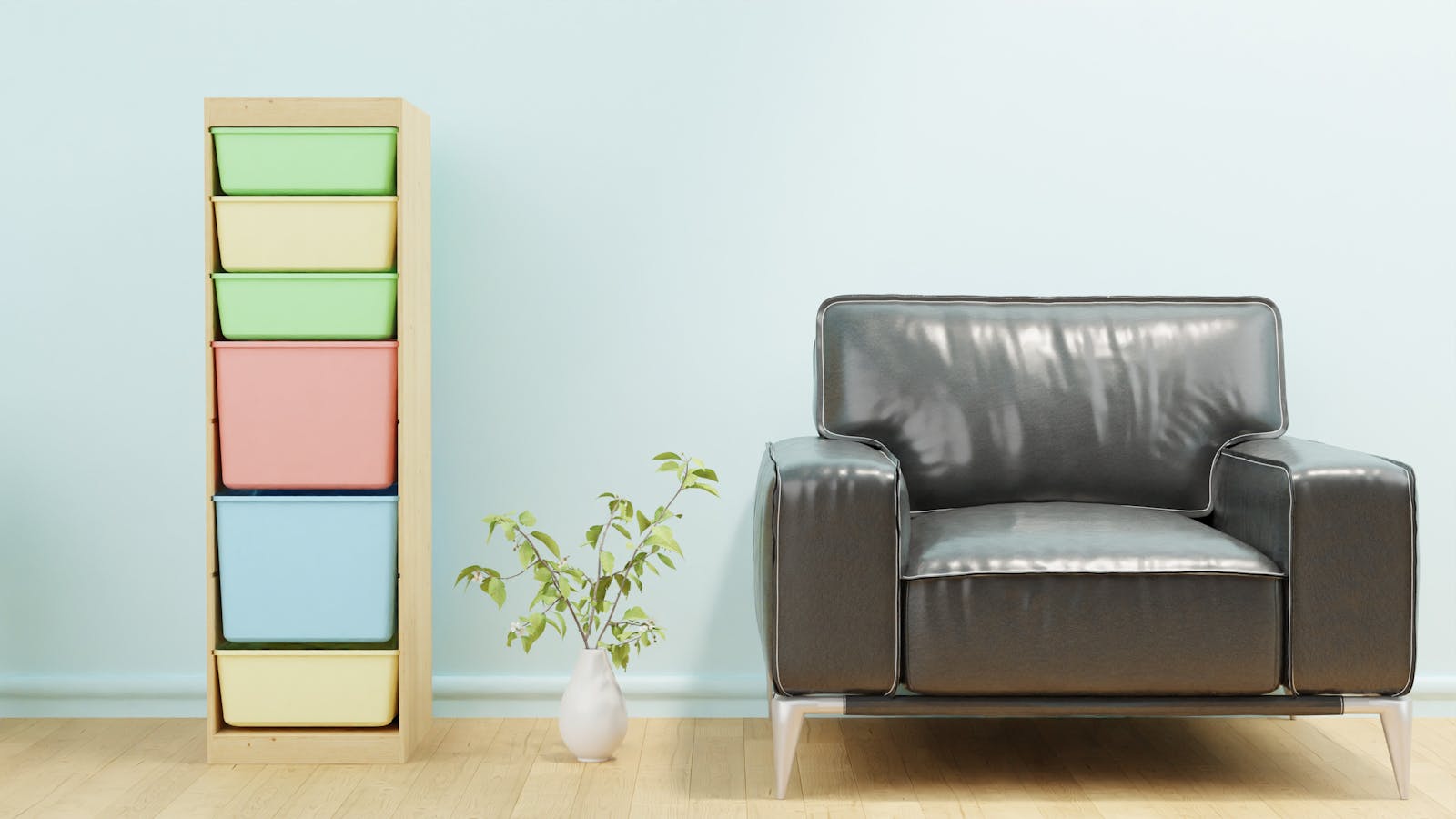 Stylish living room featuring a leather sofa, colorful storage, and a vase with greenery.