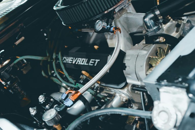 Close-up of a chevrolet engine with many parts.