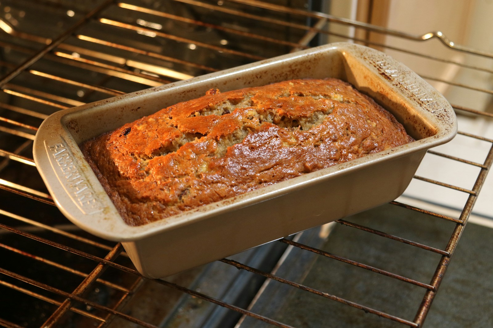 a loaf of bread sitting on top of an oven rack