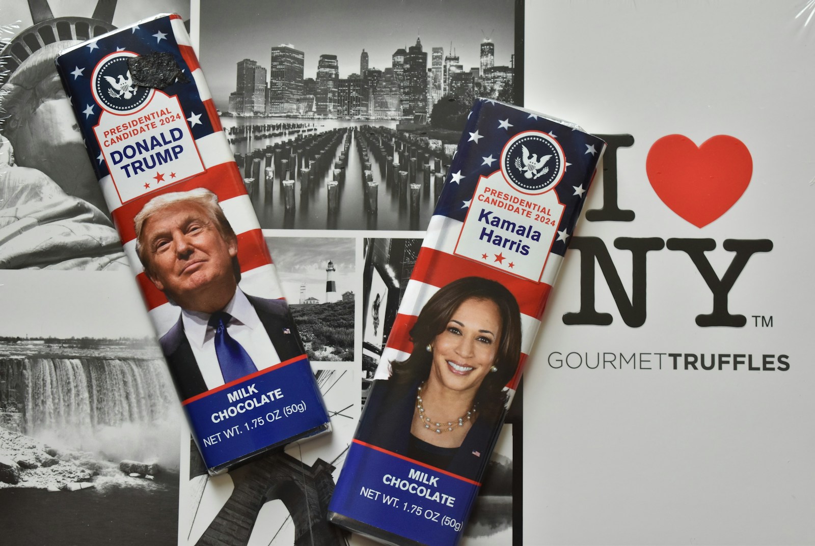 A couple of packages of toothpaste sitting on top of each other