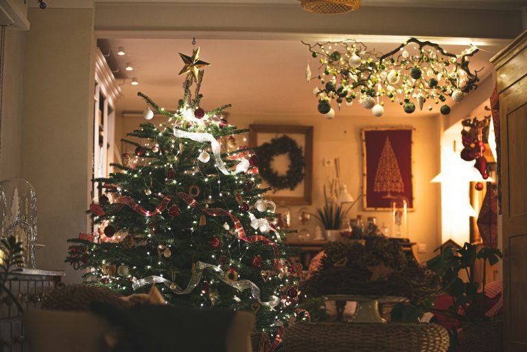a decorated christmas tree in a living room