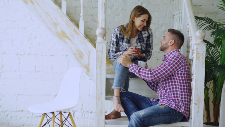 Couple talking on a staircase