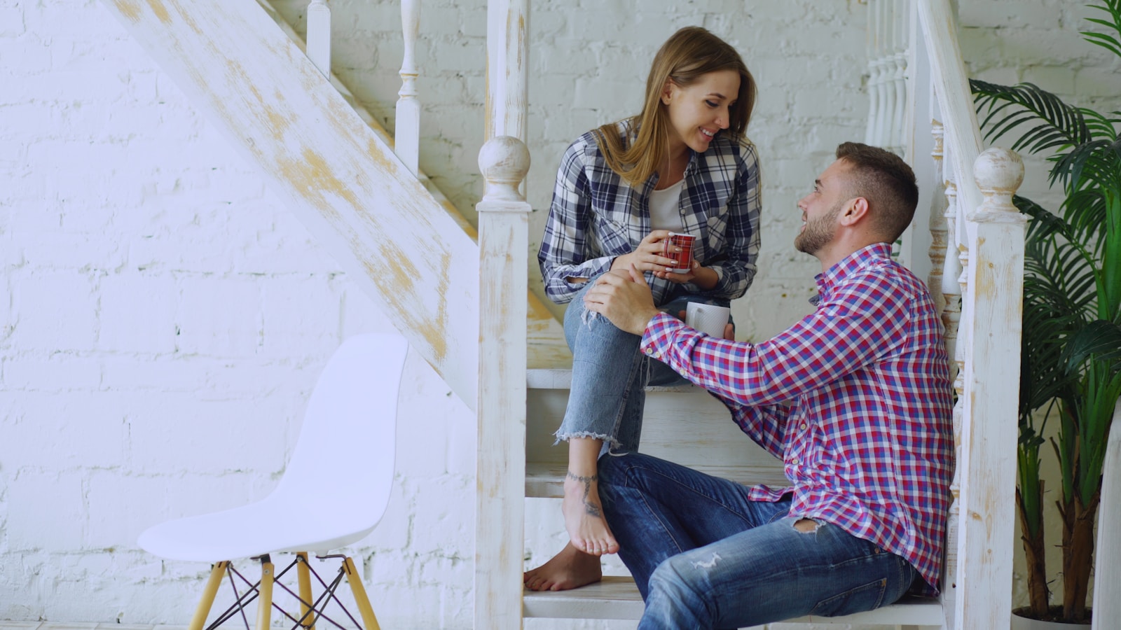 Couple talking on a staircase