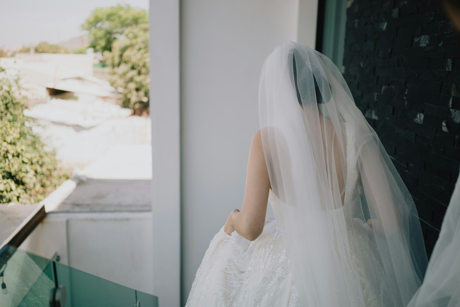Bride in a white wedding dress and veil