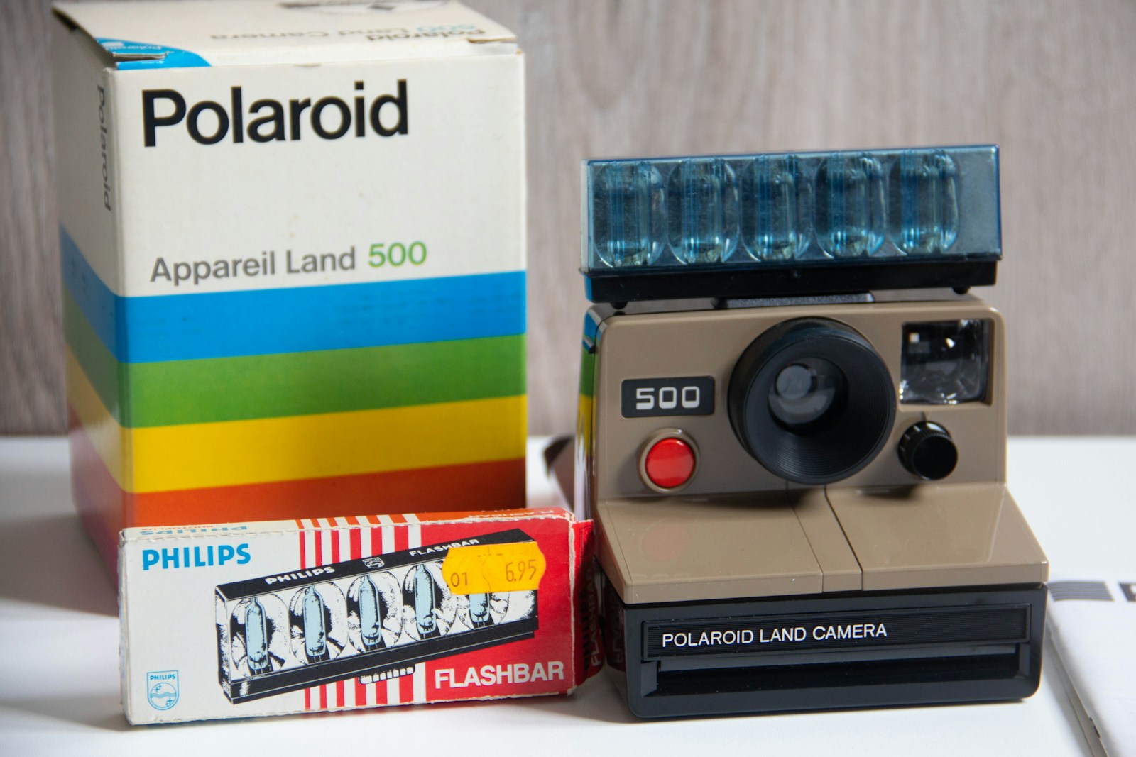 white and black polaroid camera