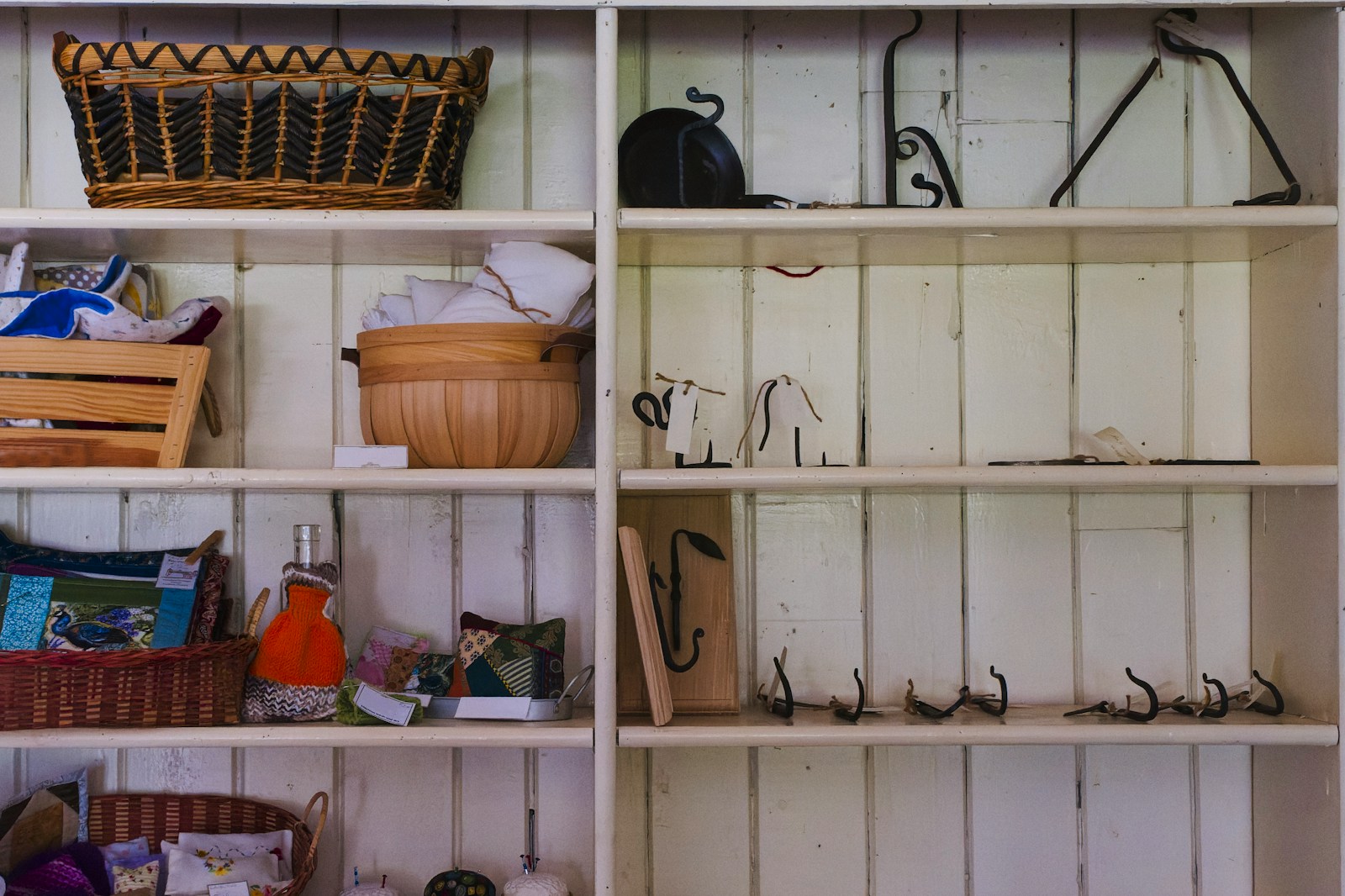 a shelf filled with lots of different types of items