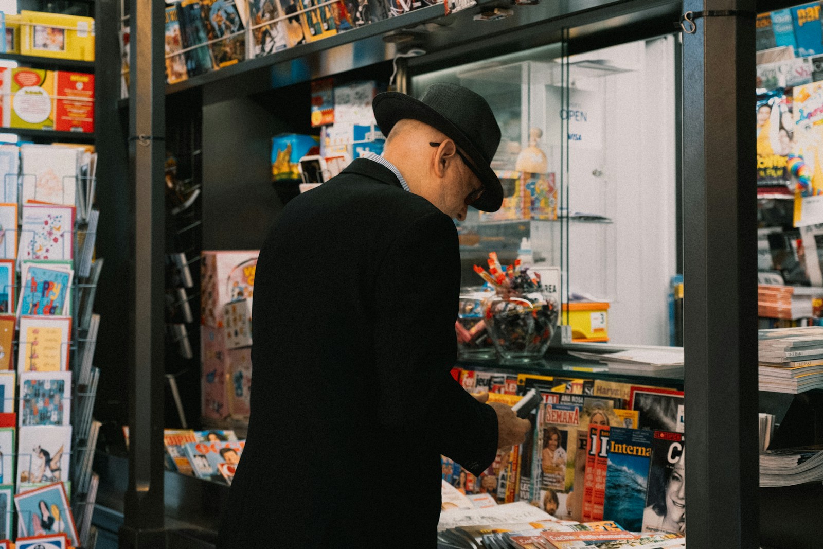 a man in a black hat