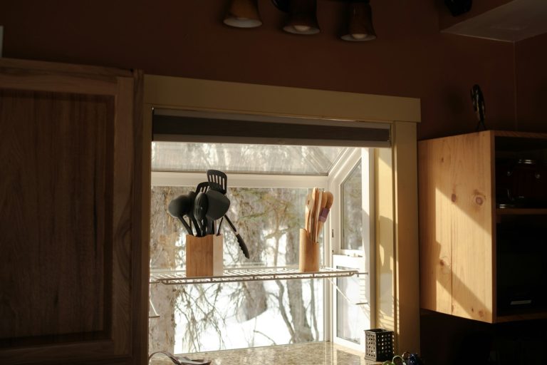 white wooden framed glass window