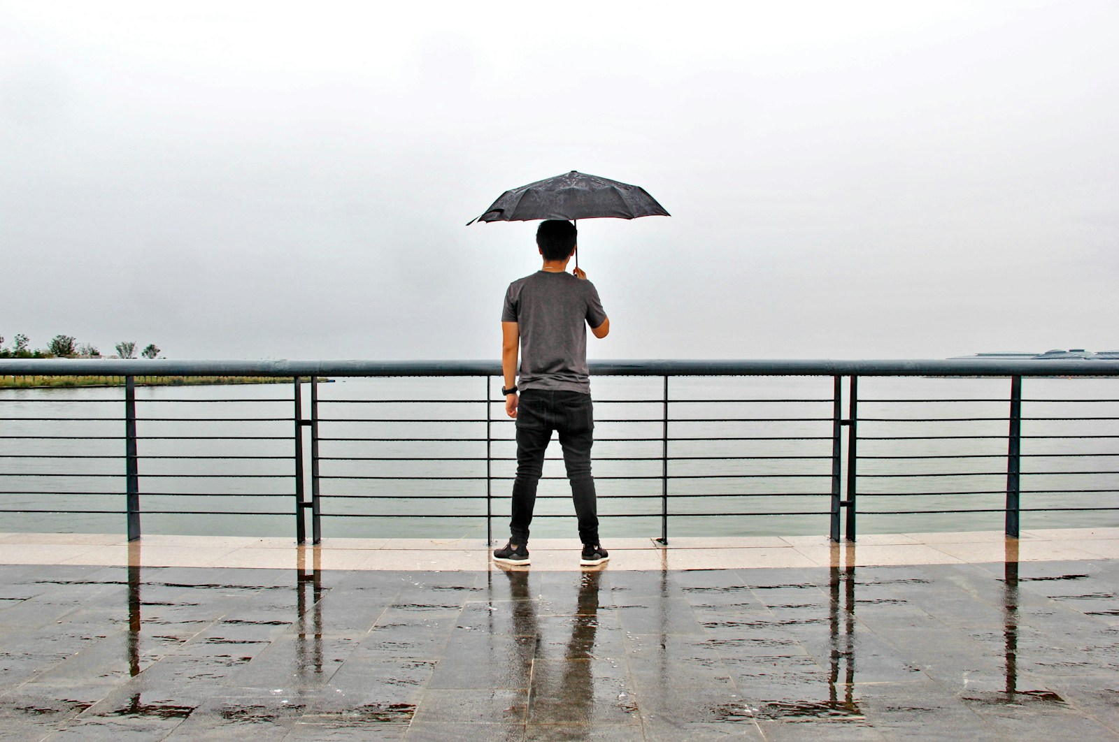 a woman holding an umbrella