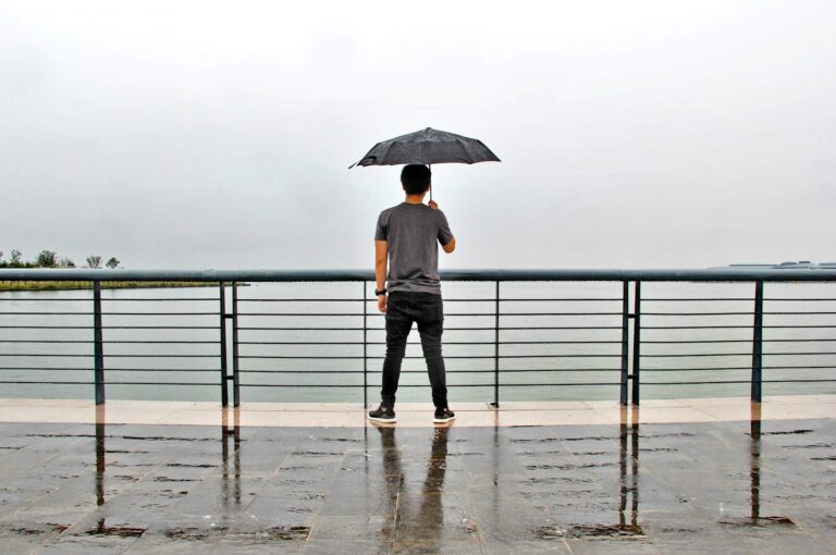 a woman holding an umbrella