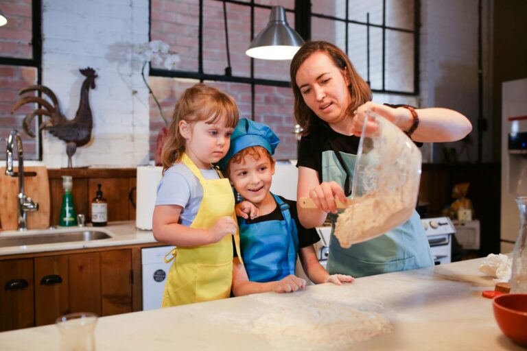 A mother and children baking together in a cozy kitchen, sharing quality time.