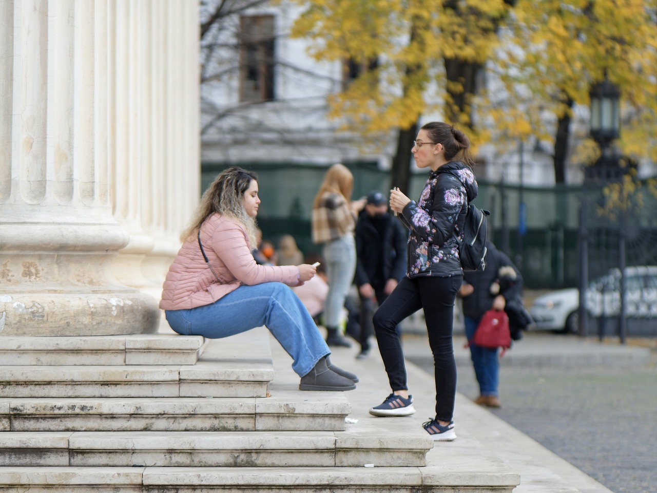 people, young, girls, outdoor, building, columns, relaxing, talking