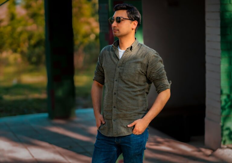 a man standing in front of a building