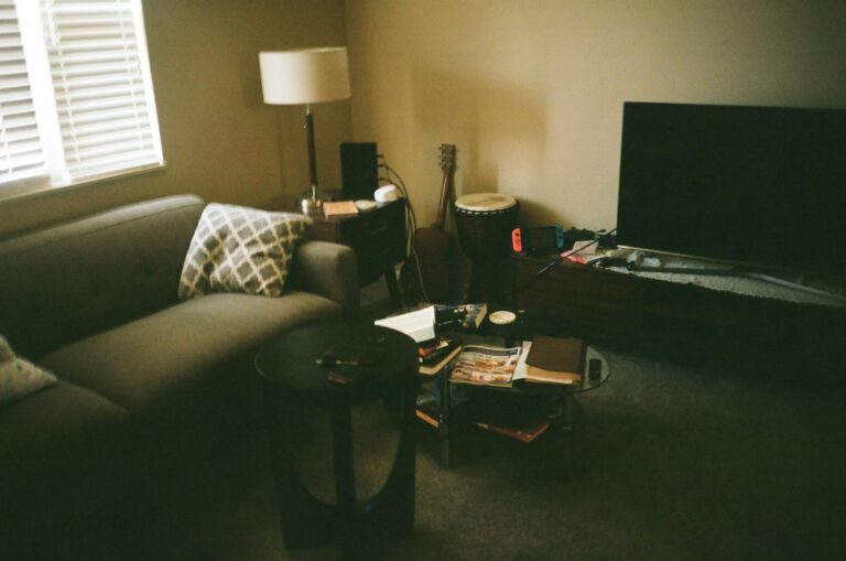 A living room filled with furniture and a flat screen TV
