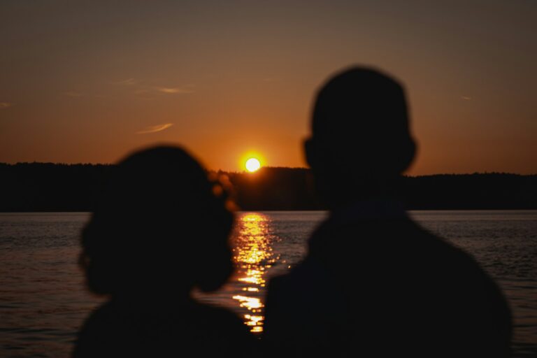 A couple of people standing next to each other