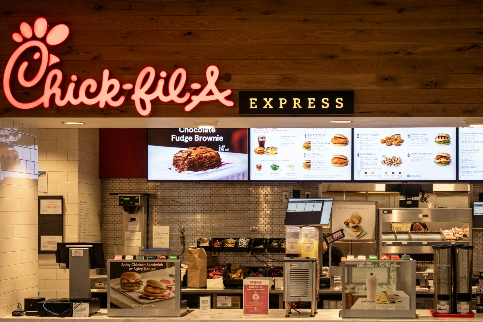 a fast food restaurant with a large menu