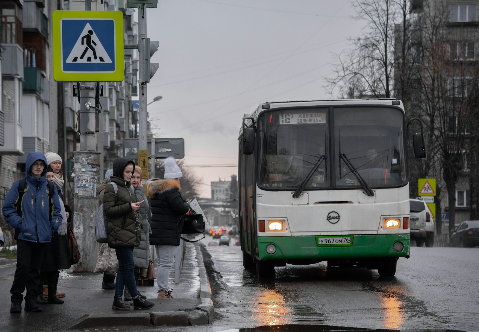 people walking on sidewalk during daytime
