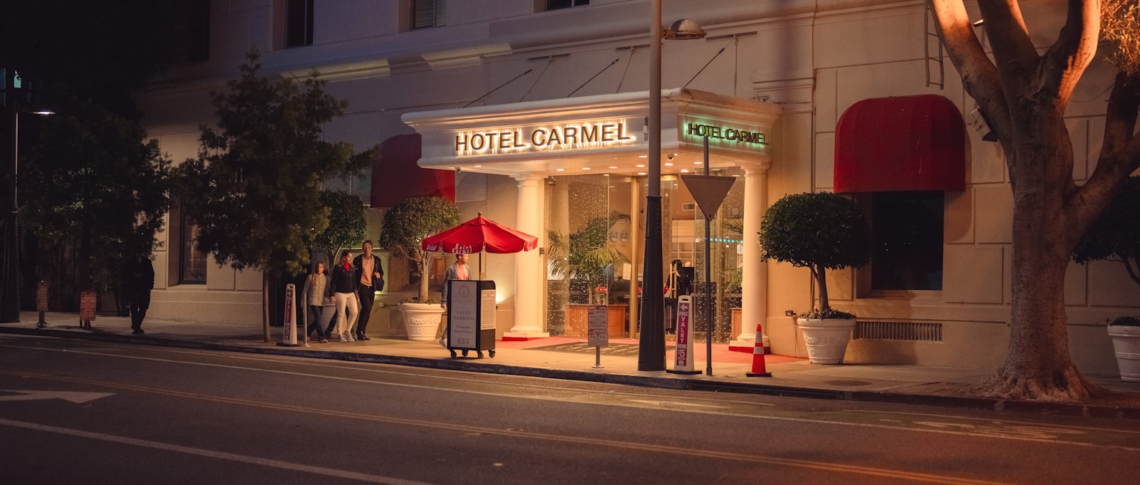 a hotel that is lit up at night