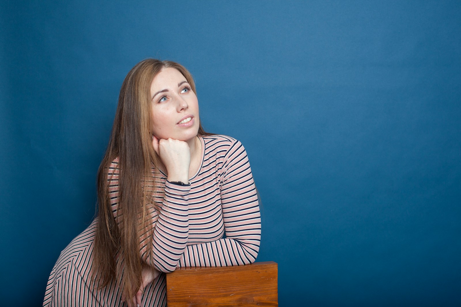 a woman sitting on a chair
