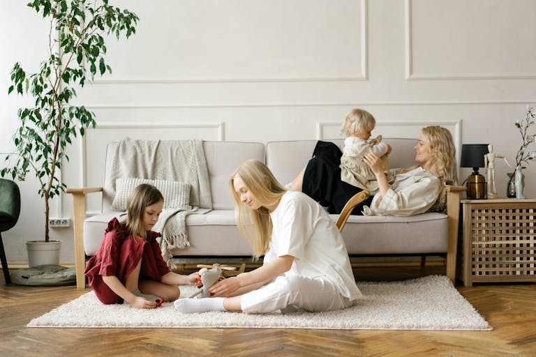 A family enjoys quality time together in a modern living room, promoting warmth and connection.