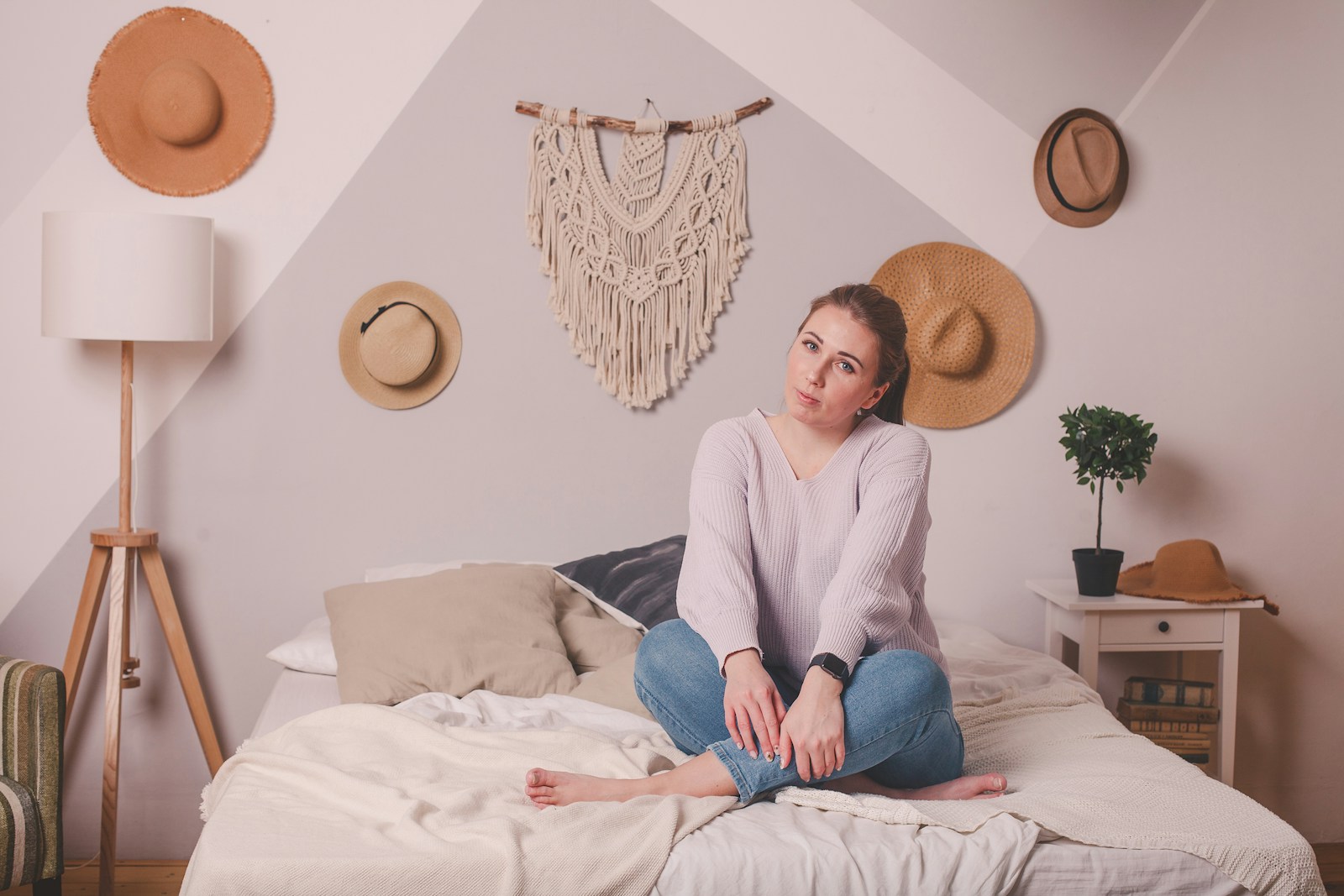 a person sitting on a bed