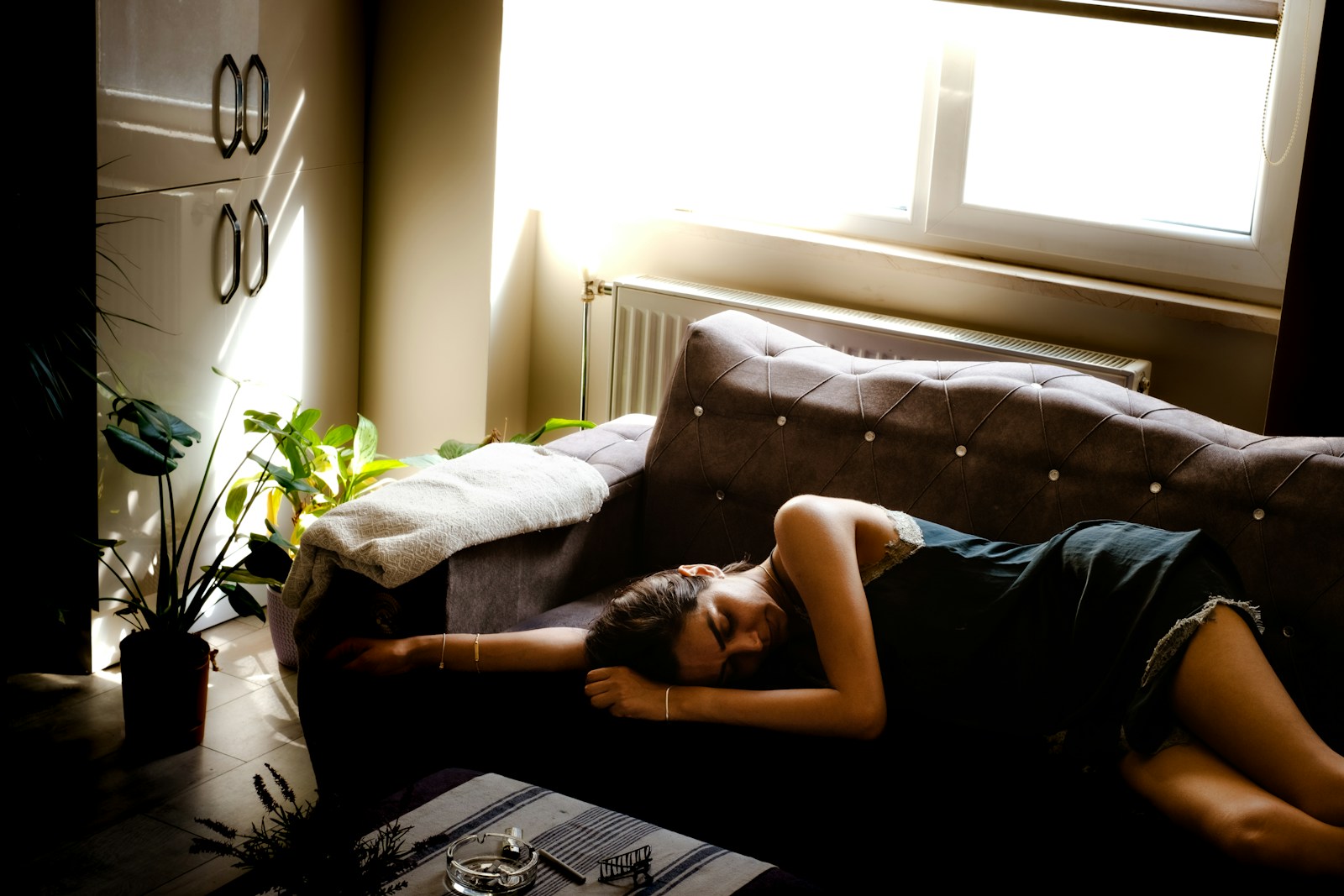 a woman lying on a couch