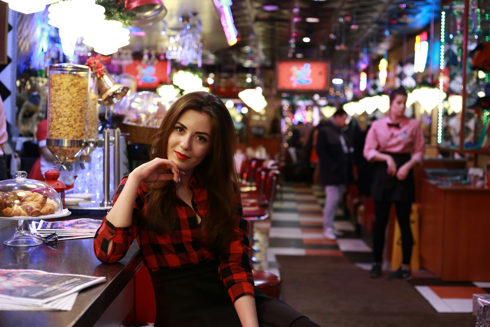 woman in red and black plaid long sleeve shirt