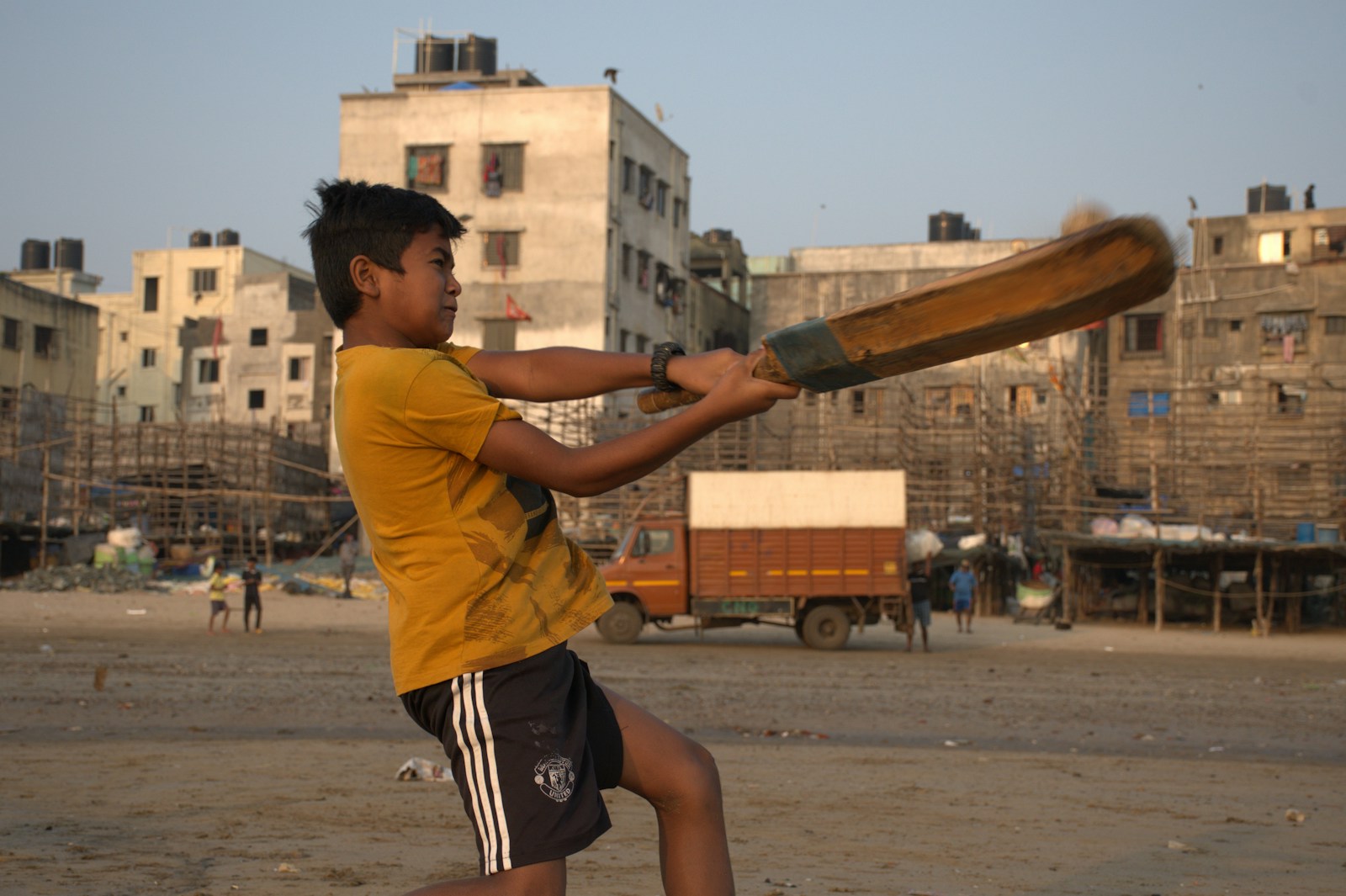 a person holding a baseball bat