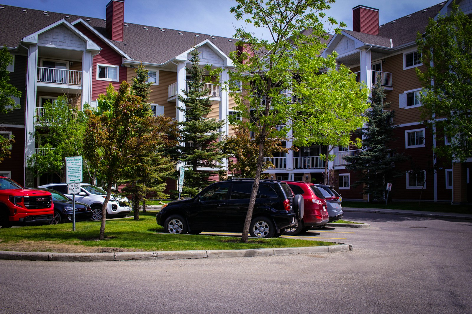 a parking lot with several cars parked in it