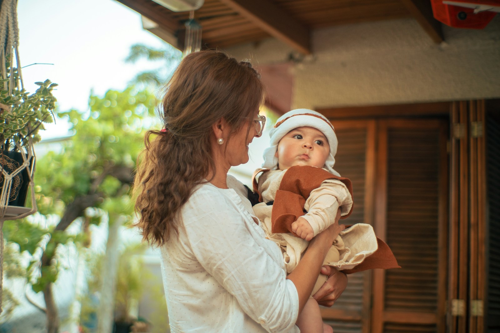 a person holding a baby