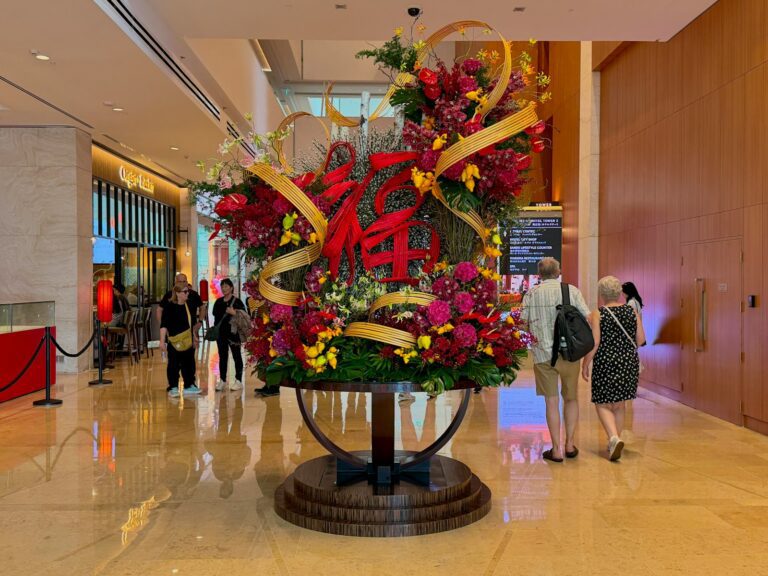 Large floral arrangement with red chinese characters