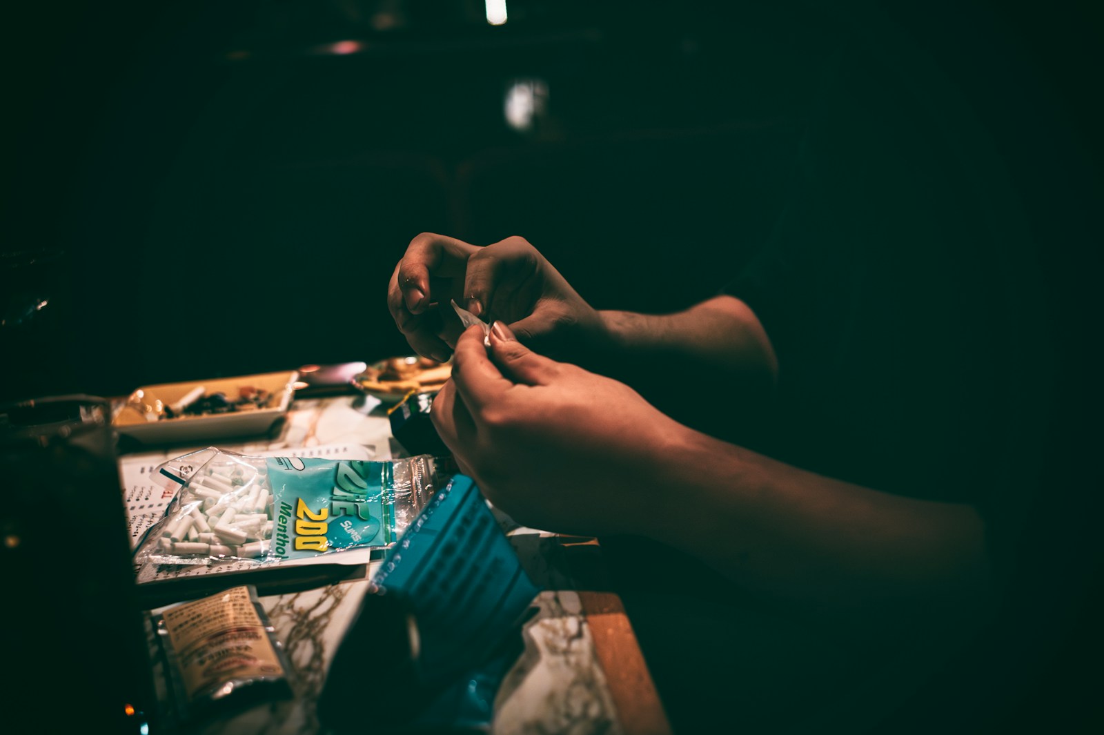 A person is painting a picture on a table