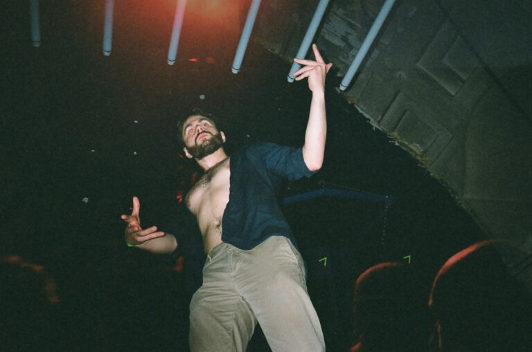 man wearing blue top