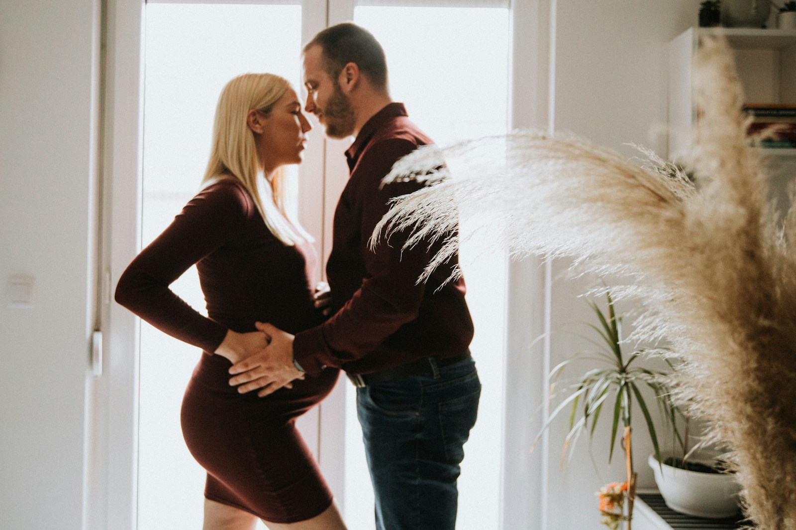 a man and a woman standing next to each other