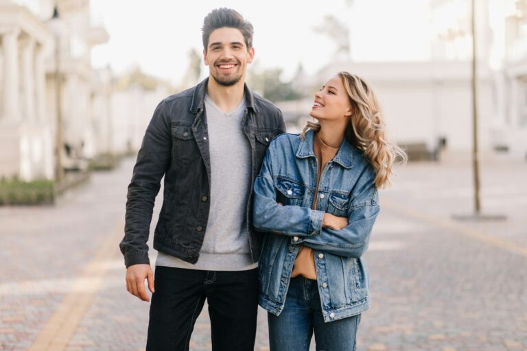 A man and a woman standing next to each other
