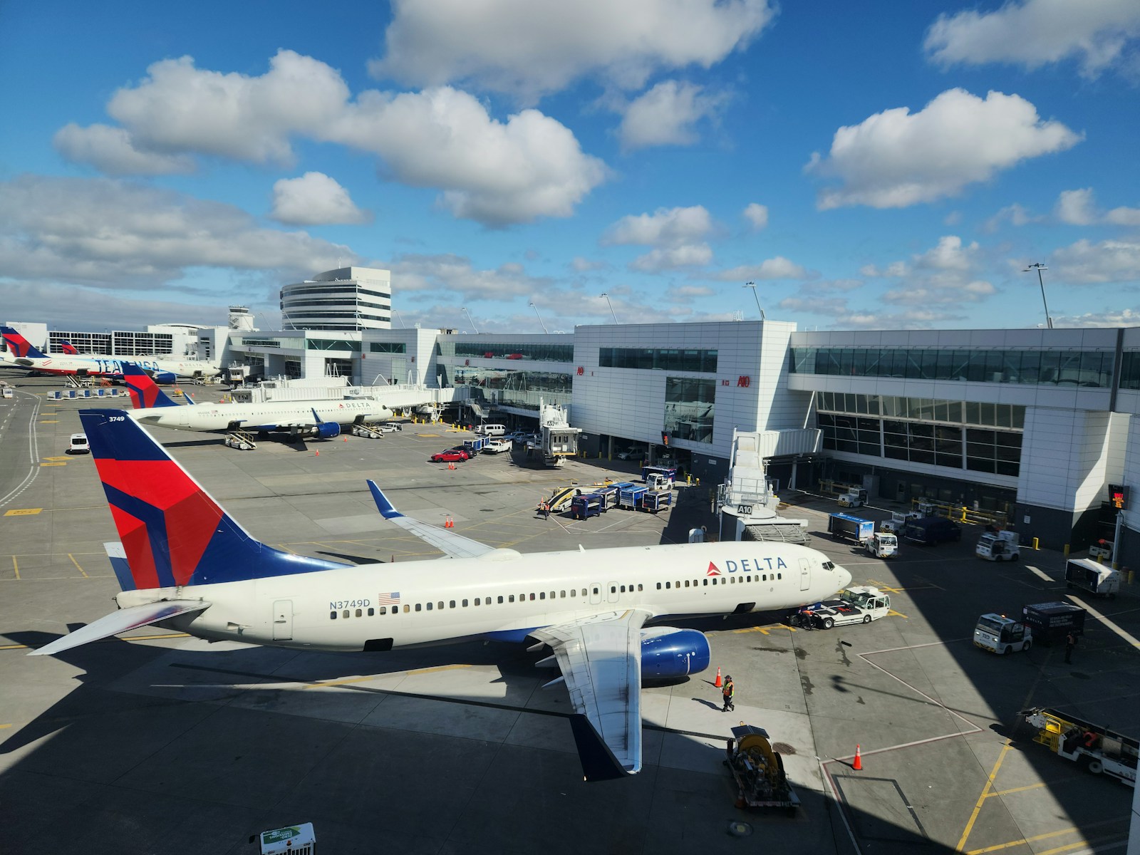 a large jetliner sitting on top of an airport tarmac