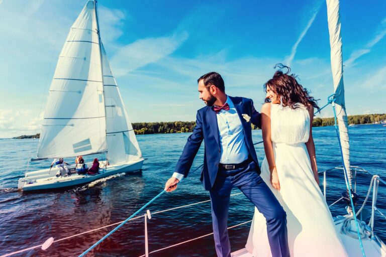 Captivating photo of a bride and groom sailing on a yacht, exuding elegance and joy on their special day.
