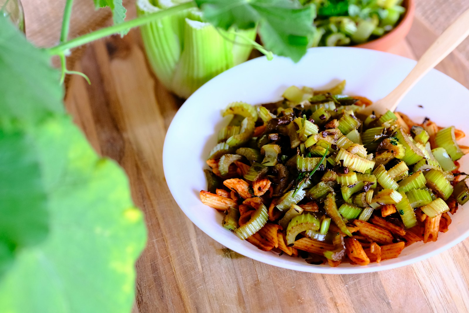 green vegetable dish on white ceramic bowl
