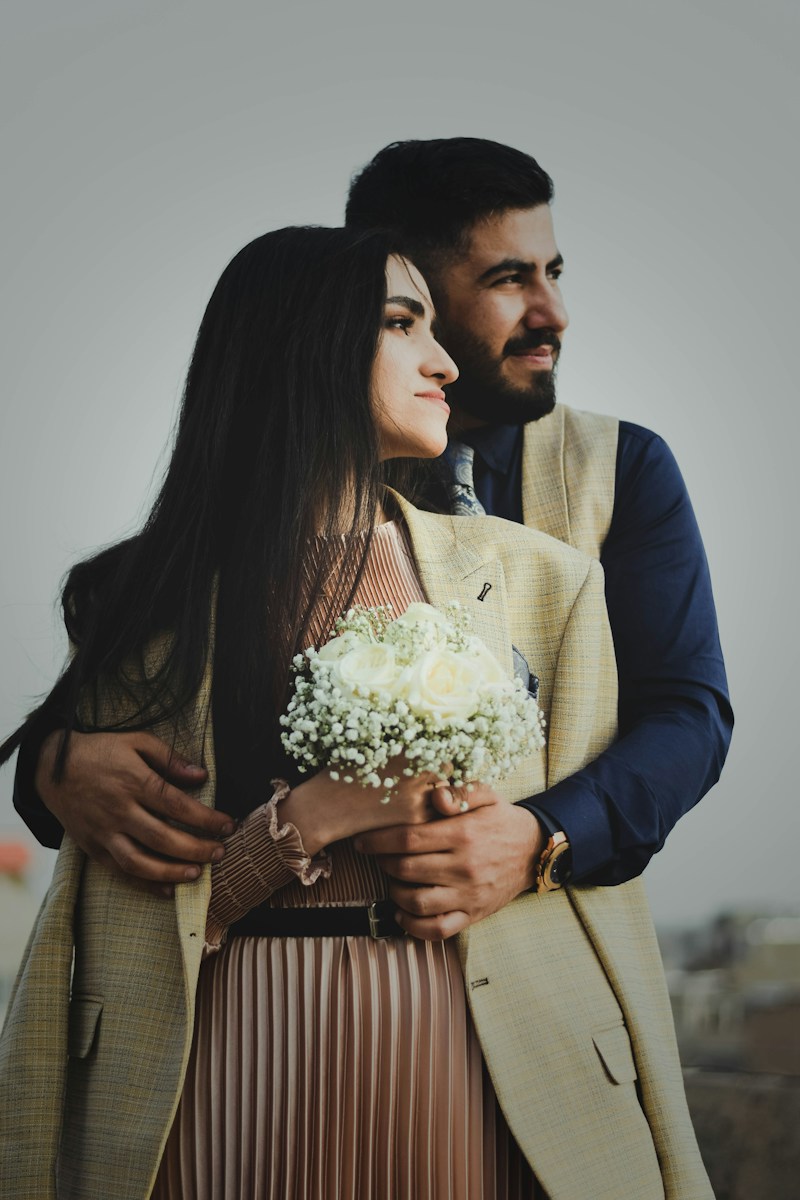 a man and a woman embracing each other