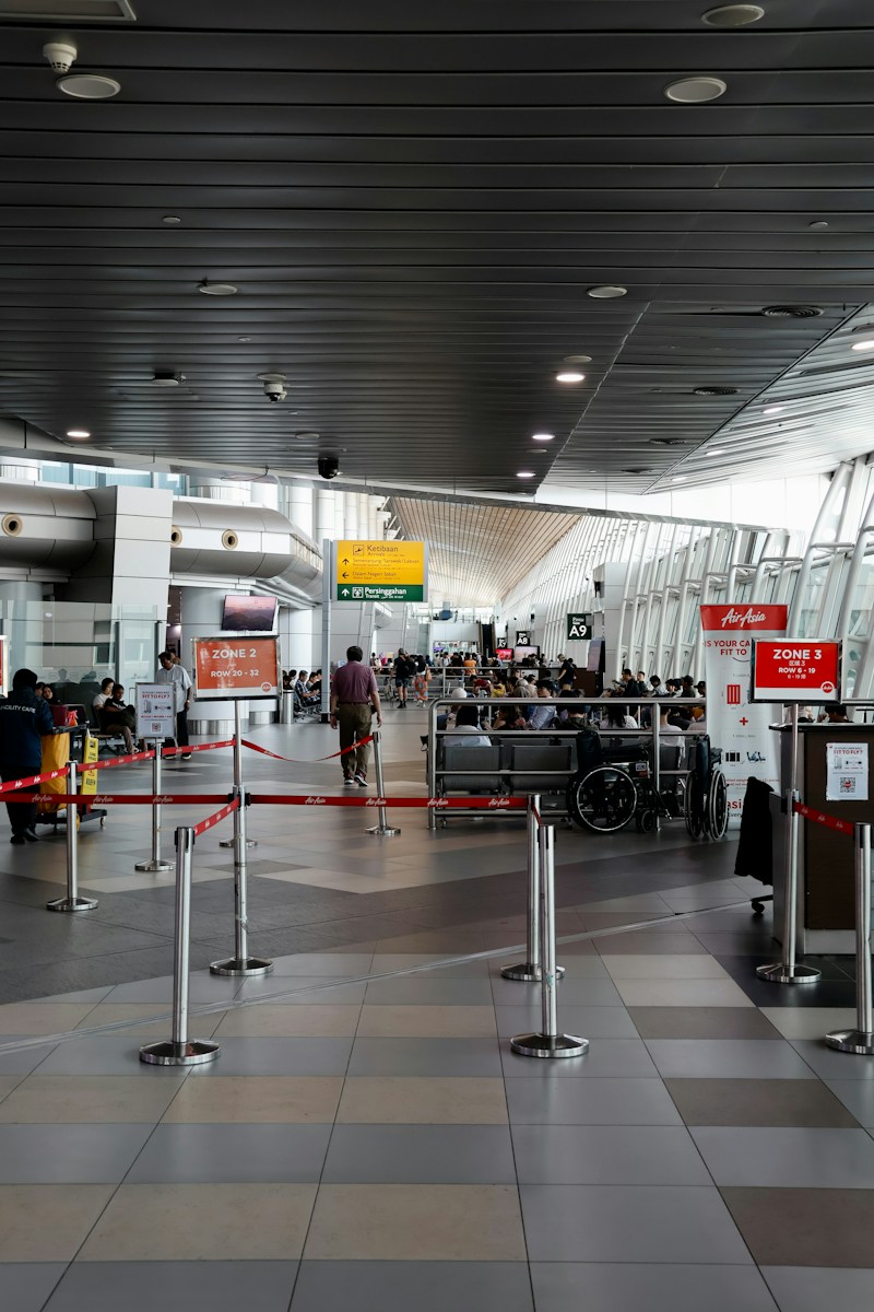 People waiting in a modern airport terminal