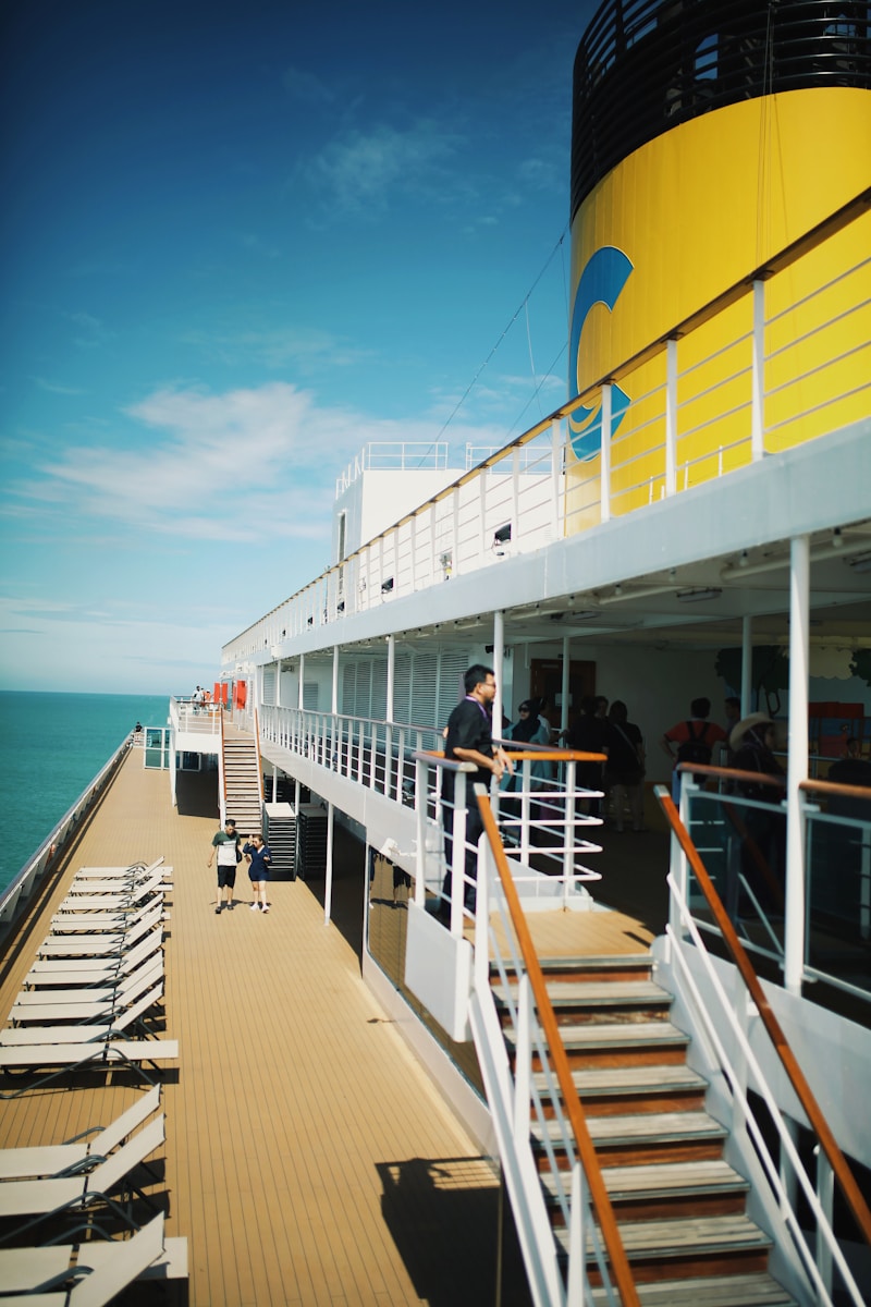 Deck of a cruise ship with people and ocean view