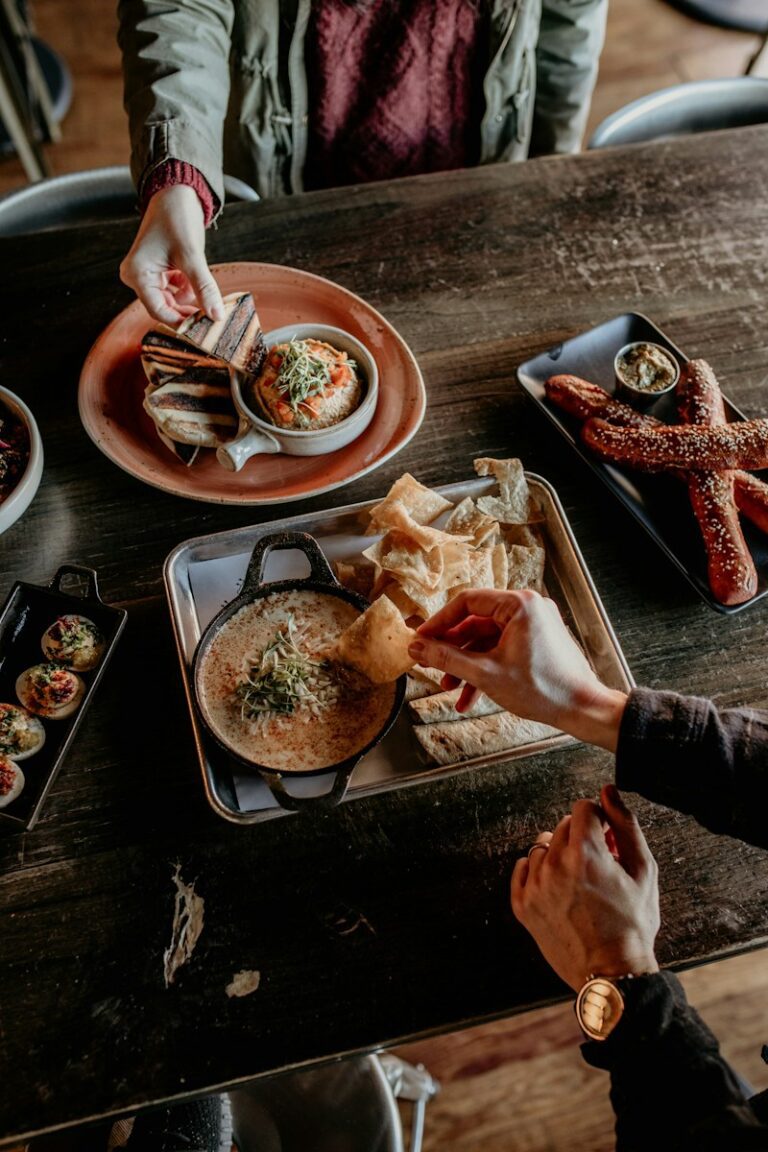 a person holding a plate of food