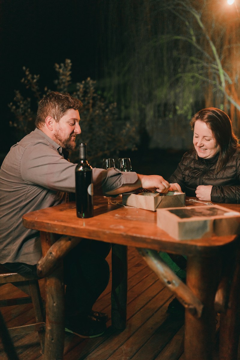 A man and a woman sitting at a table